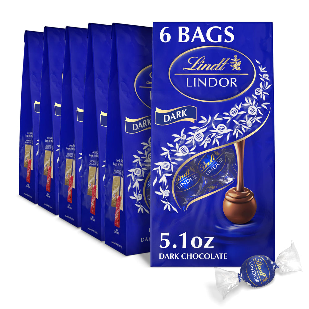 Lindt LINDOR dark truffles shell close-up showcases glossy shell and premium craftsmanship.