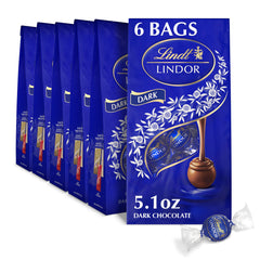 Lindt LINDOR dark truffles shell close-up showcases glossy shell and premium craftsmanship.