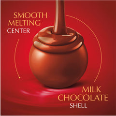 Lindt LINDOR Milk Truffles shell-center close-up highlights smooth melting center
