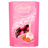Lindt Lindor Strawberry & Cream truffle shell close-up, smooth melt perfect for gifting.