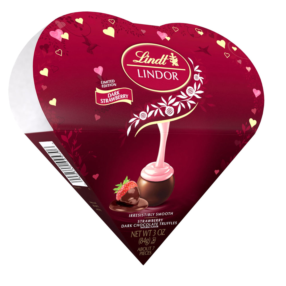 Lindt LINDOR Strawberry truffles in a friend heart box, ideal romantic gift for Valentine’s Day.