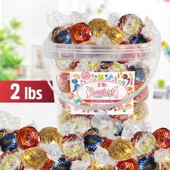 Lindt milk chocolate truffles reveal silky centers ideal for indulgent moments.