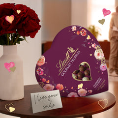 Lindt gourmet truffles closeup shows creamy centers and glossy chocolate