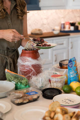 Liokareas Kalamata olives on a charcuterie board for versatile snacking