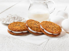 Little Debbie Oatmeal Creme Pies ingredients highlight oats and molasses.