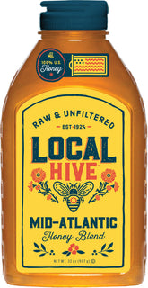 Local Hive Mid-Atlantic honey bottle on a kitchen counter for natural sweetening.