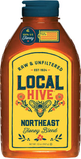 Local Hive Northeast Honey jar closeup reveals floral aroma and natural texture for tea.