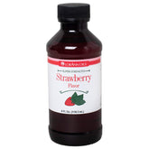 LorAnn Strawberry SS flavor bottle closeup highlights potent candy-grade strawberry notes.
