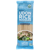 Lotus Foods Organic Brown Udon Noodles pack on a kitchen counter, ideal for quick weeknight meals.