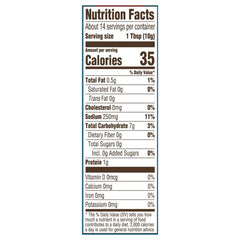 Bottle close-up of Louisiana Fish Fry air fryer chicken coating mix highlighting seasoned texture and flavor.