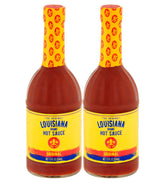 Louisiana Original Hot Sauce 12oz bottle on table for bold meal flavor.