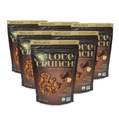 Close-up of white and dark chocolate chunks in granola, satisfying balanced snack