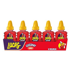 Lucas Chamoy Gusano pieces in hand ready for bold snack