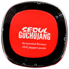Lucky Seoul gochujang paste on bibimbap bowl, vibrant color and umami.
