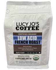 Lucy Jo's Coffee Organic Low Acid French Roast ground coffee in a bag, smooth for easy mornings.