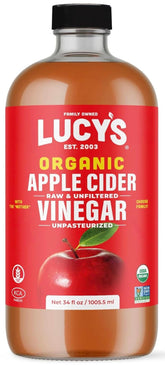 Lucy’s Organic Apple Cider Vinegar bottle ready for salads and beverages.