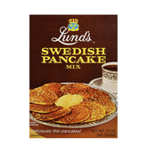 Lund's Swedish Pancake Mix packaging on a kitchen counter, premium quality for authentic taste.