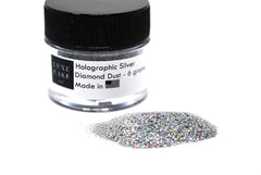 Luxe Cake Silver Hologram Dust bottle adds shimmering detail to cakes and cupcakes.
