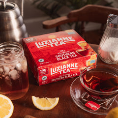 Poured Luzianne iced tea into a glass, amber and clear