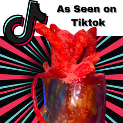 Ma Lit Candy fruit roll-up with chamoy drizzle, ideal for playful pairings.