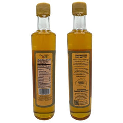 Mac Nut Oil being poured into a pan for sautéing and searing