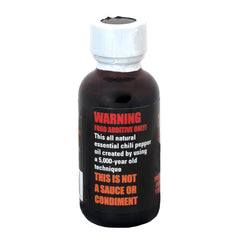 Mad Dog Gear ECO 1 Million Scoville amber oil closeup highlighting rich aroma and purity.