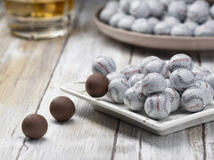 Madelaine premium milk chocolate baseballs in half-pound pack for gifting.