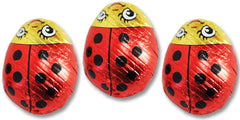 Red and black foil wrappers on Madelaine lady bugs for celebrations.