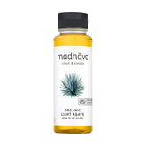 Madhava Golden Light Blue Agave bottle pour enhances beverages with neutral sweetness.