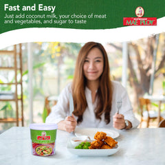 Mae Ploy Green Curry Paste creates vibrant, fragrant curry dishes with a rich Thai-green color.