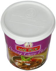 Mae Ploy Panang paste tub close-up, rich aroma for authentic Thai curry at home.