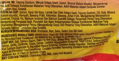 Maggi 2 Minute Noodles Curry Flavour sachet closeup for easy seasoning.