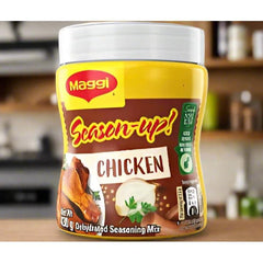 Applying Maggi Season-Up as a dry rub to grill juicy chicken