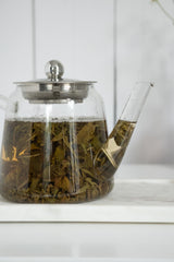 Green tea leaves used in MagJo Jasmine Dragon Pearls