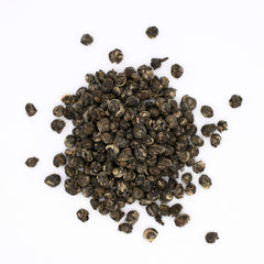 Hand-rolled Jasmine Dragon Pearls showing craftsmanship and care
