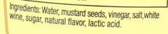 Spoonful of Maille Old Style mustard for marinades and bright vinaigrettes
