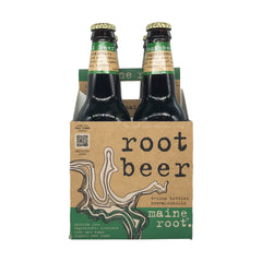 Maine Root bottle being poured to reveal a clear, caffeine-free soda