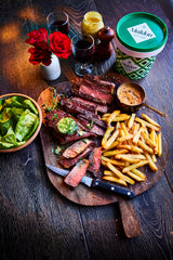 Maldon Sea Salt flakes on grilled meats enhance crust.
