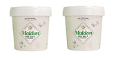 Maldon sea salt flakes pyramid crystals in a glass jar for finishing flavor