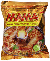 MAMA Creamy Tom Yum Spicy noodles in a steaming bowl for a quick flavorful meal.