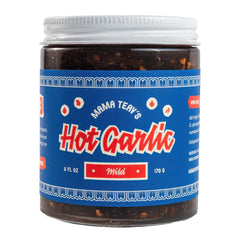 Mama Teav's Mild Garlic Chili Crisp bottle adds gentle heat and depth to meals.