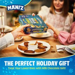 Hanukkah table scene featuring Manischewitz coins centerpiece.