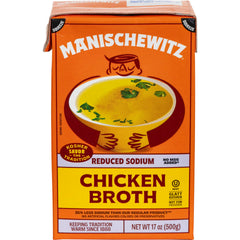 Pouring Manischewitz reduced sodium chicken broth into a pot for depth.