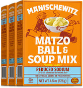 Manischewitz reduced-sodium matzo ball soup mix in a bowl with fluffy matzo balls