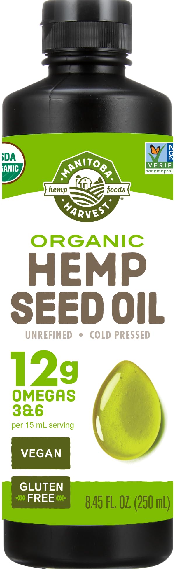 Manitoba Harvest organic hemp oil bottle ready to drizzle over a salad.