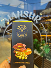 MANSUR Viral Dubai chocolate bar packaging displayed for a gift-ready presentation.
