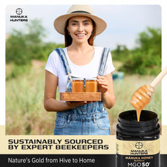 Pouring Manuka Hunters honey into tea for natural sweetness