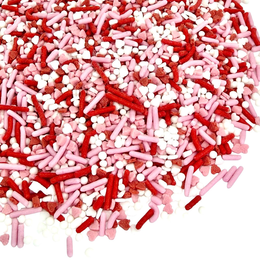 Manvscakes Valentine Sprinkles Heart Toppers add festive color to cookies and cakes.