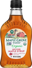 Maple Grove Farms Maple Syrup glass bottle close-up showing amber color.