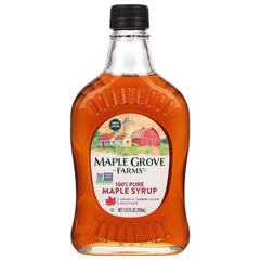 Maple Grove Farms Pure Maple Syrup bottle on table for breakfast sweetness